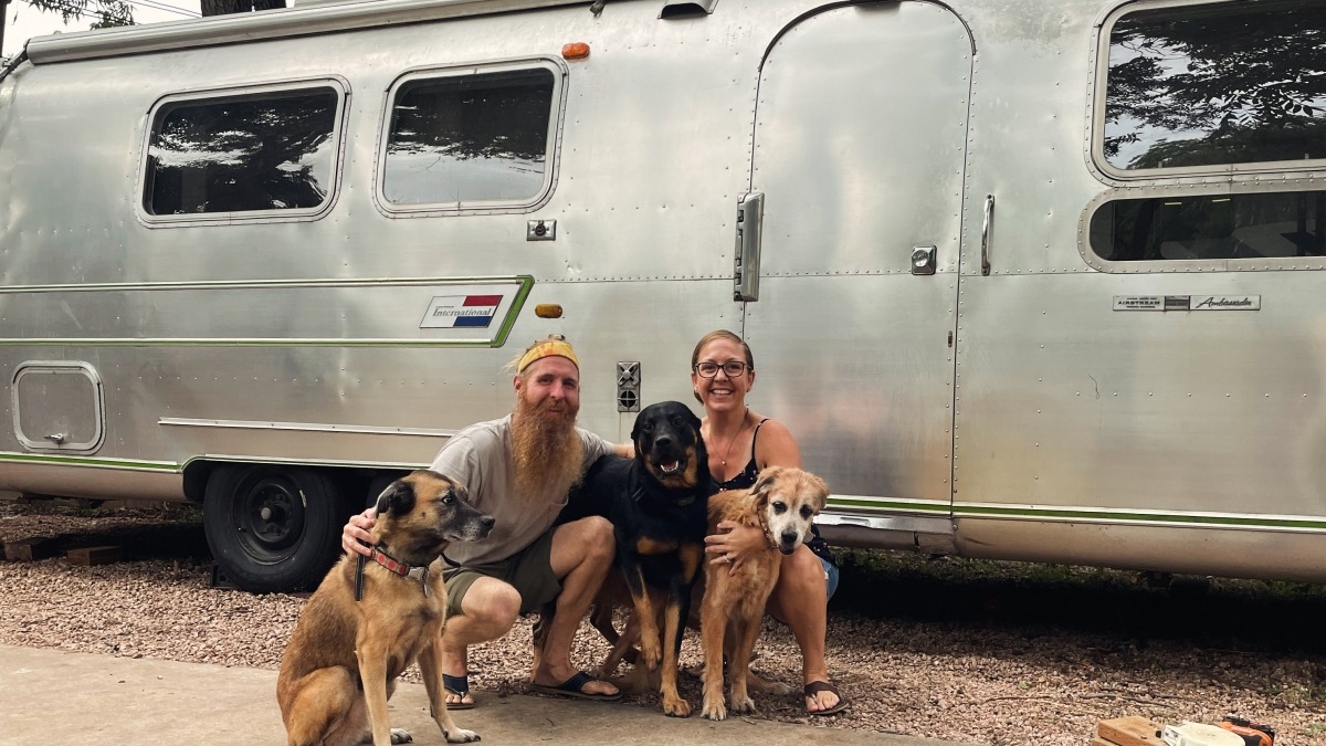 Us and our 3 dogs outside our 1969 airstream :)
