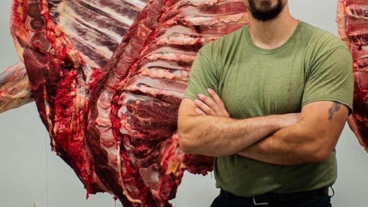 Me posing next to  a bison that I slaughtered