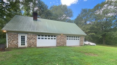 Workshop with additional apartment space and wood burning fireplace 